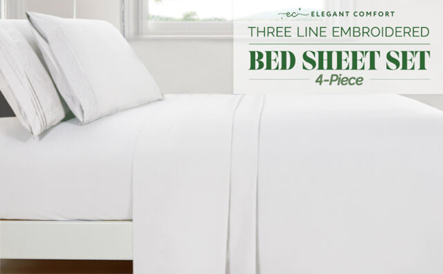 a bed sheet in a room Elegant Comfort 4-Piece Bed Sheet Set