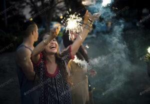 Woman Enjoying Sparkler in Festival Event Envato Elements